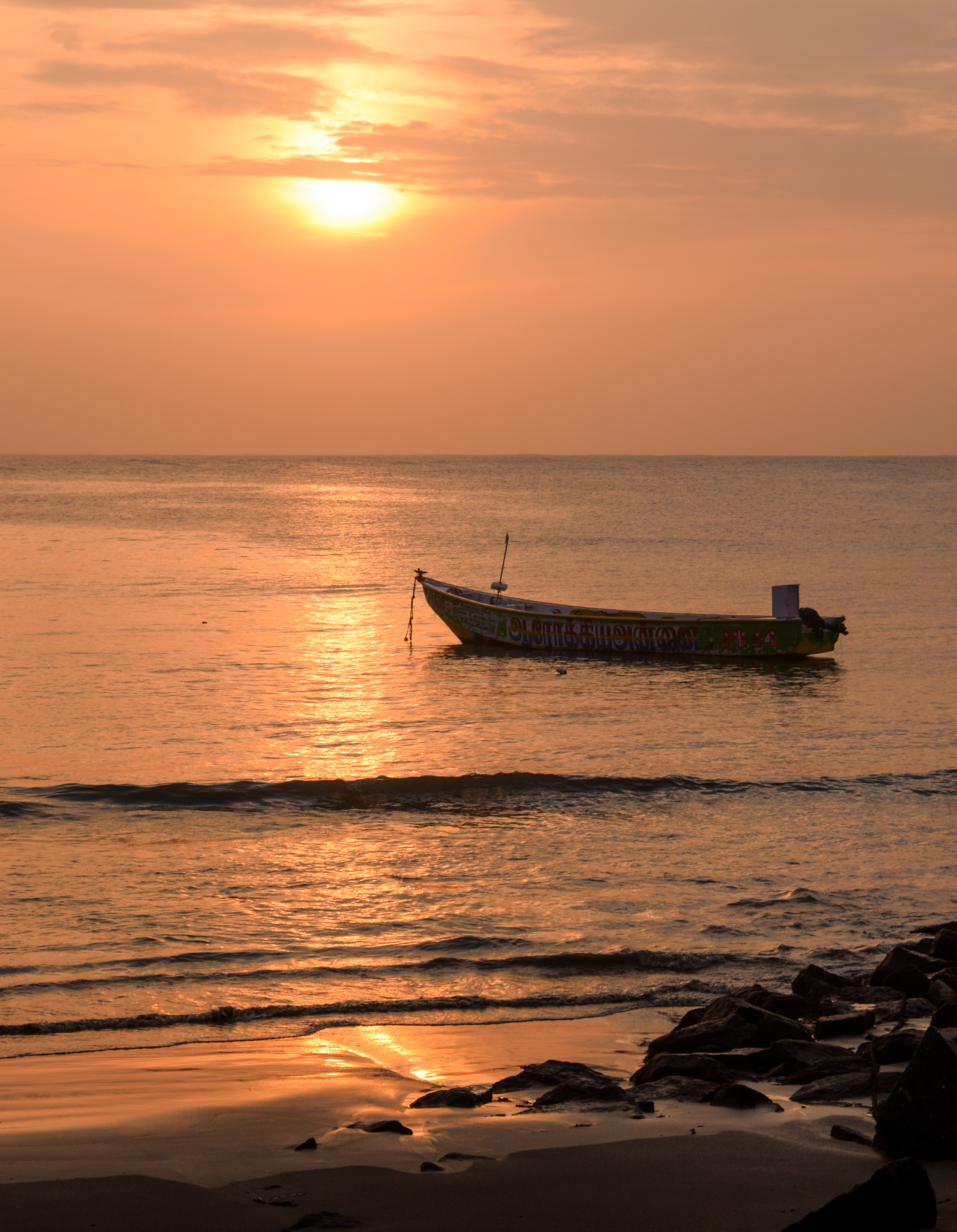 Golden Sunset Over Sea with Fishing Boat – Coastal Landscape India