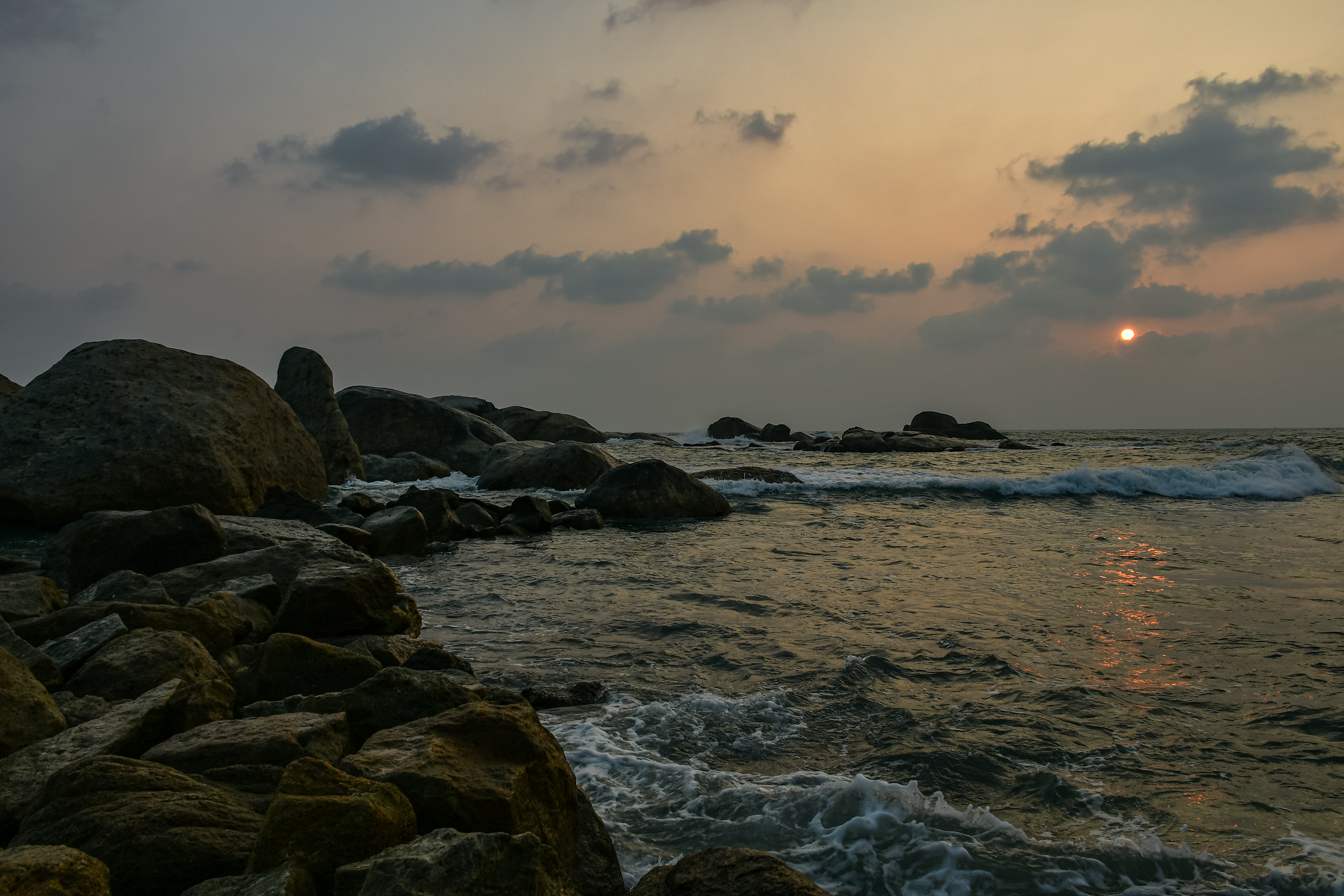 Kanyakumari Rocky Beach Sunset with Ocean Waves