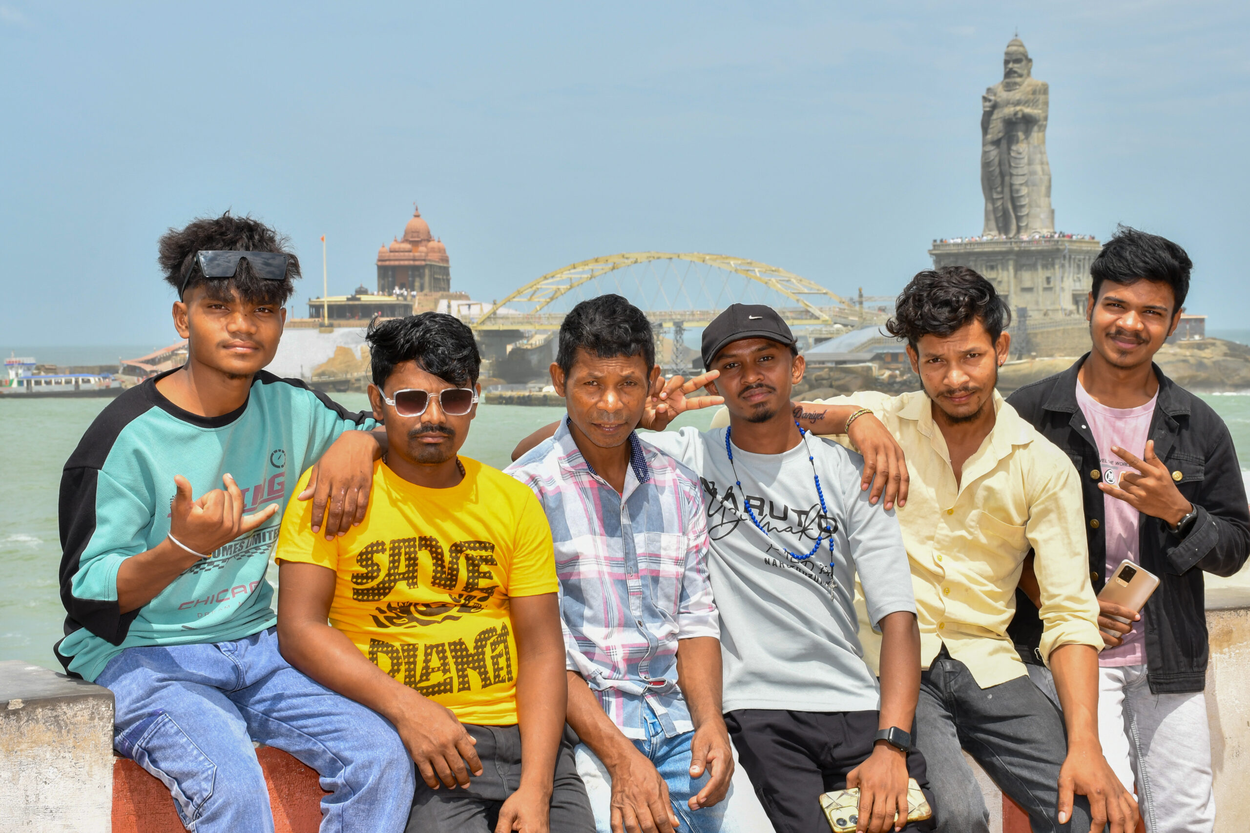 Friends group photography at Kanyakumari with Vivekananda Rock Memorial in the background